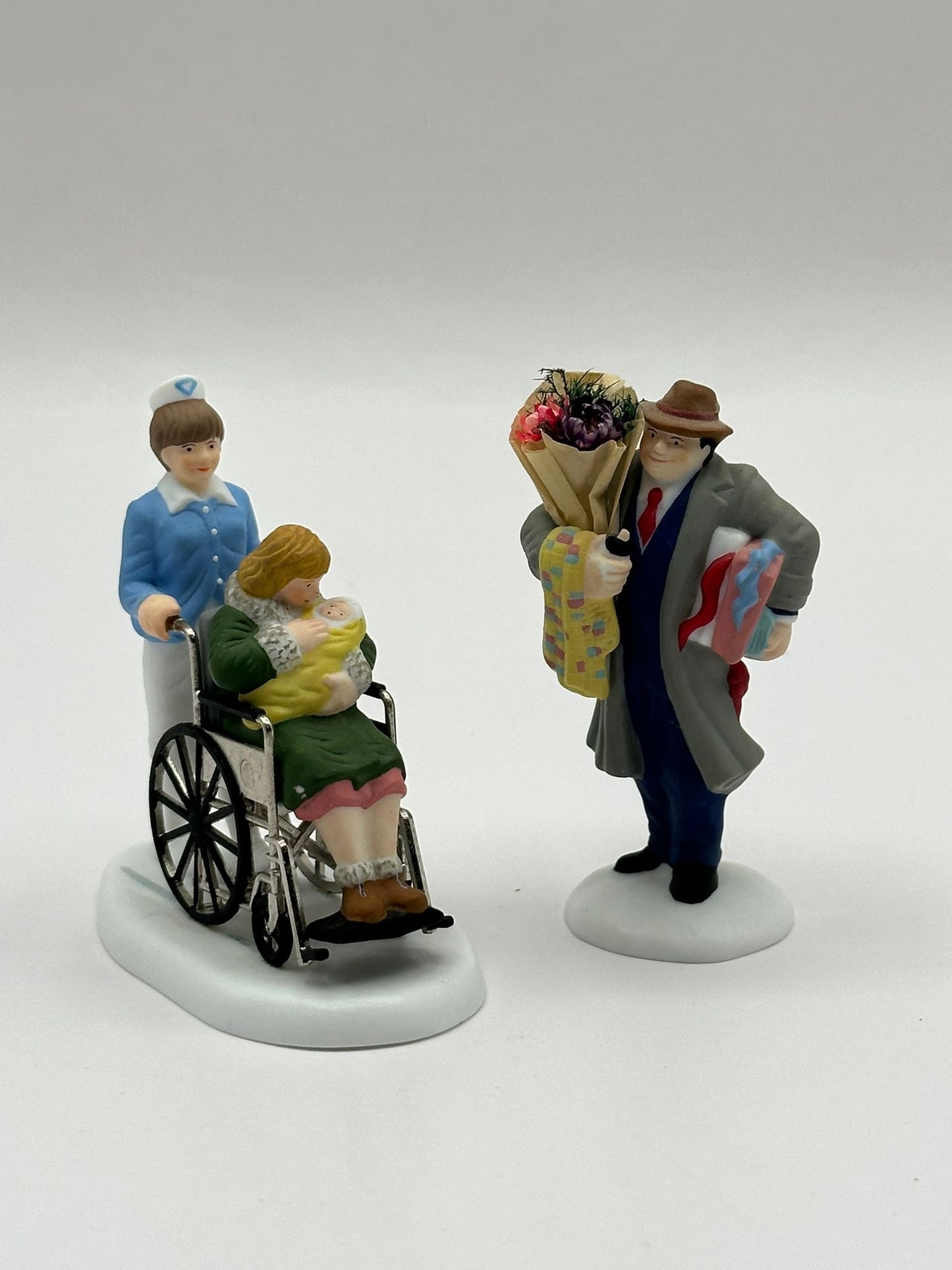 Department 56 - Bringing Home The Baby - Christmas in the City