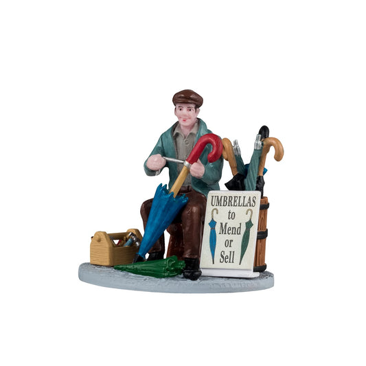 Lemax Umbrella Vendor - Caddington Village Christmas village figurine