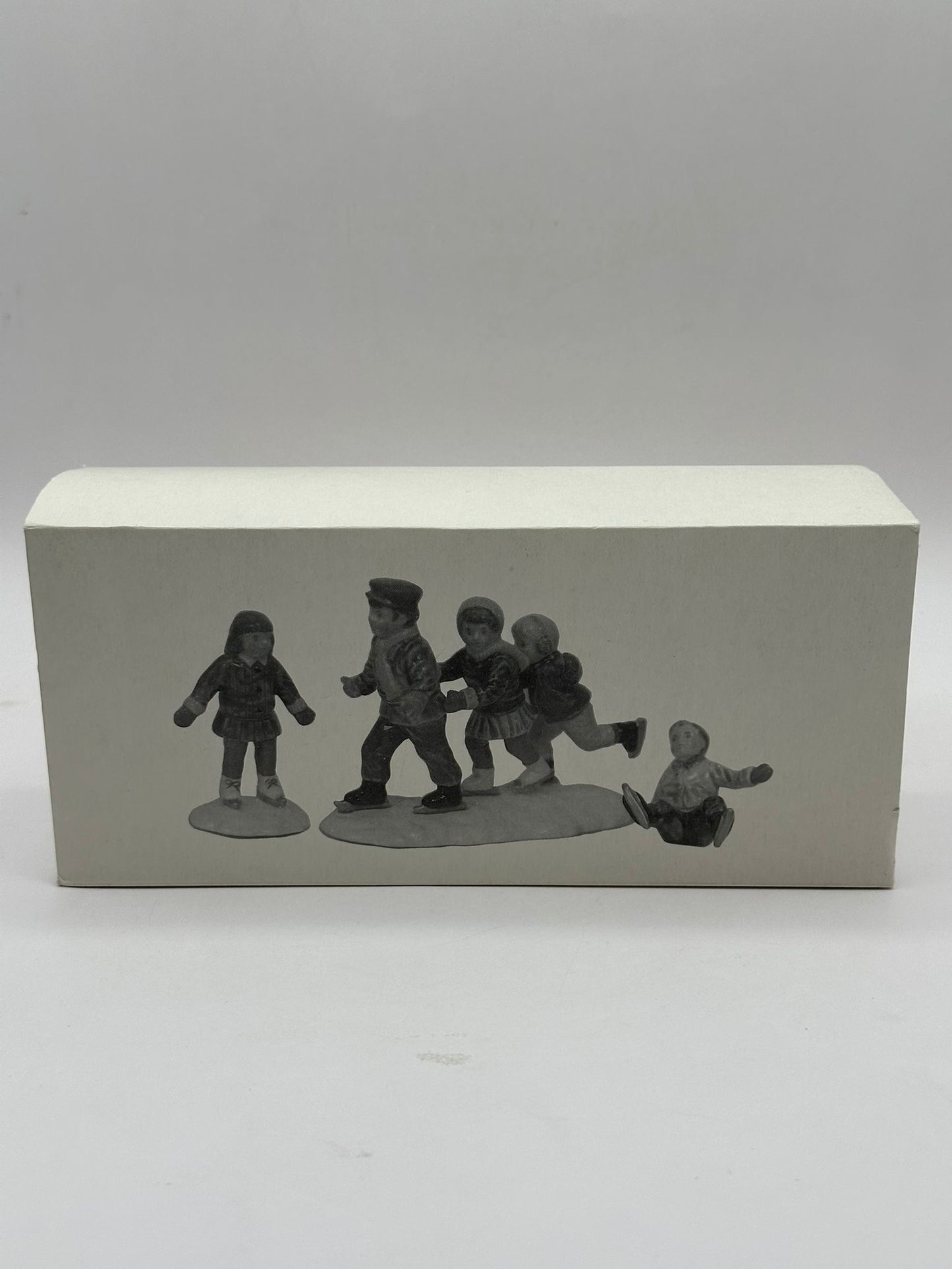 Department 56 - Crack the Whip Skaters - Original Snow Village