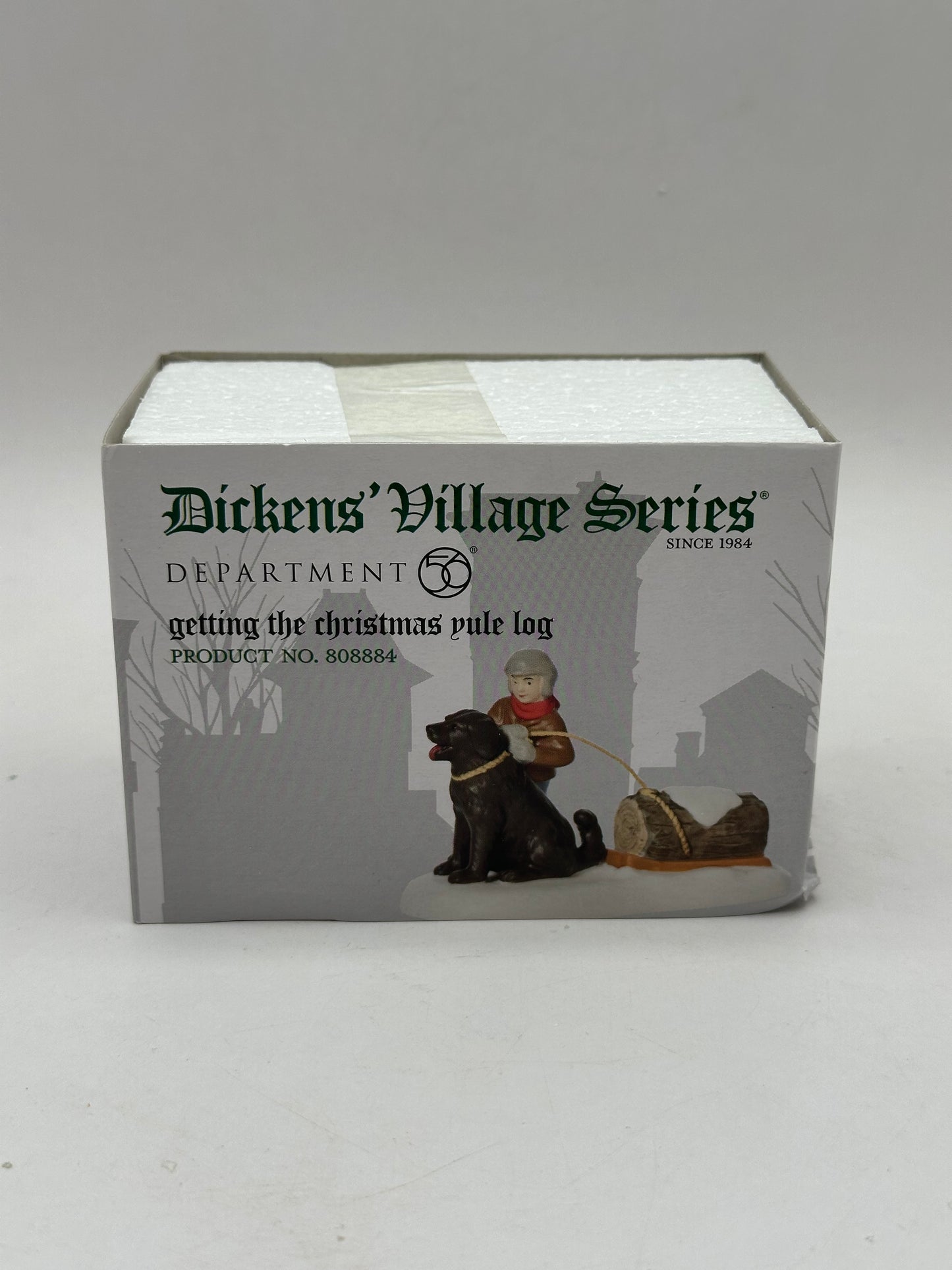 Department 56 - Getting The Christmas Yule Log - Dickens' Village