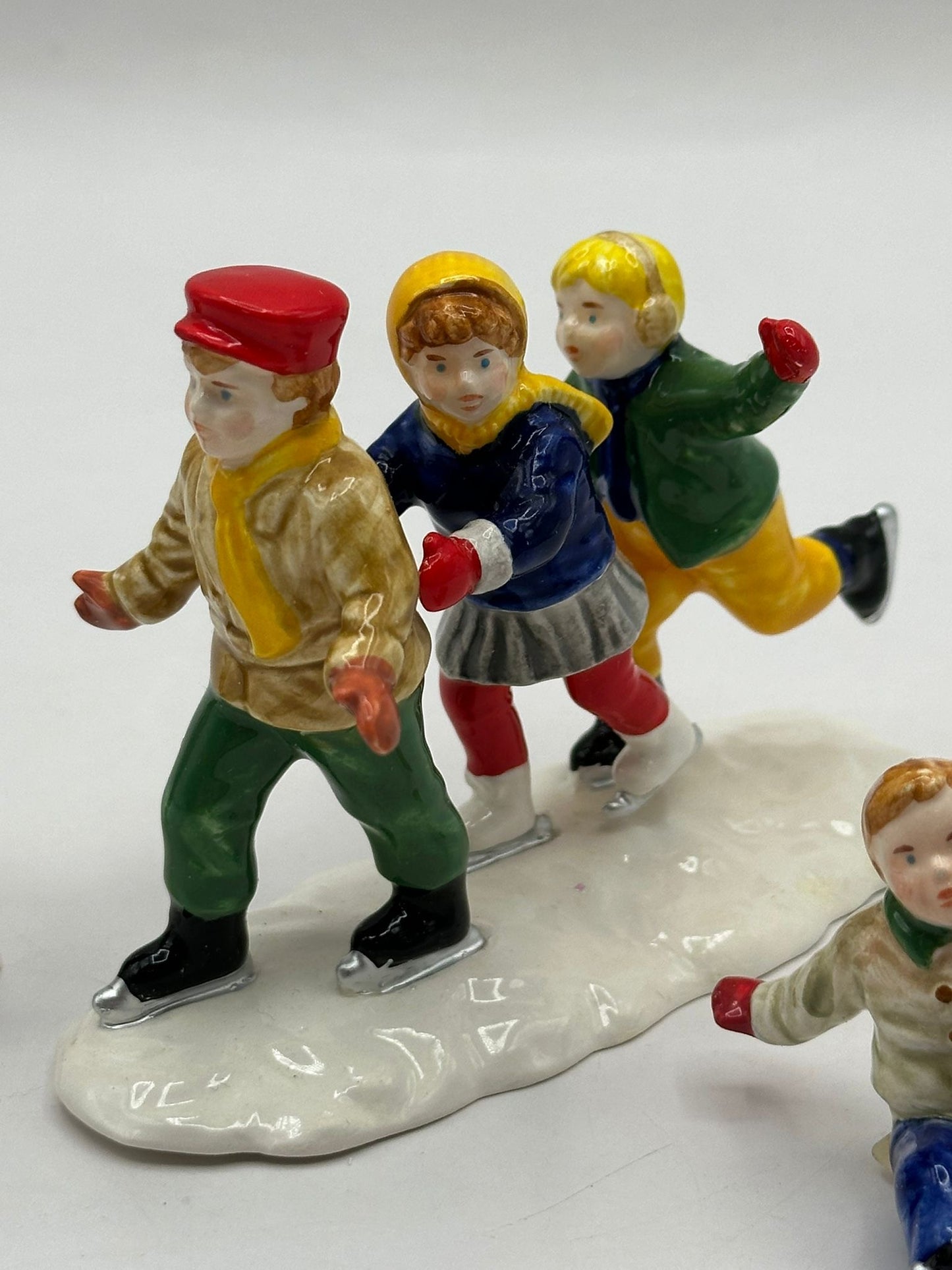 Department 56 - Crack the Whip Skaters - Original Snow Village