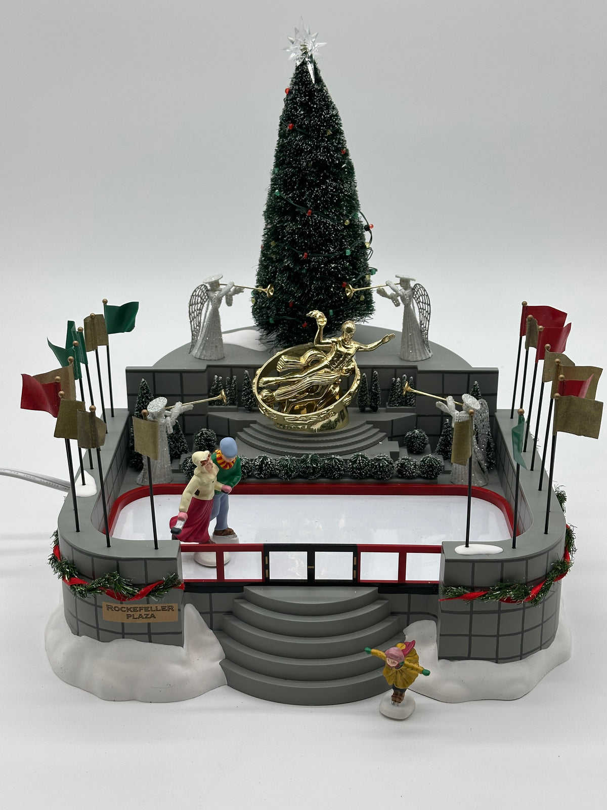 Department 56 - Rockefeller Plaza Skating Rink - Village Accessories (Only One Skater Skates)