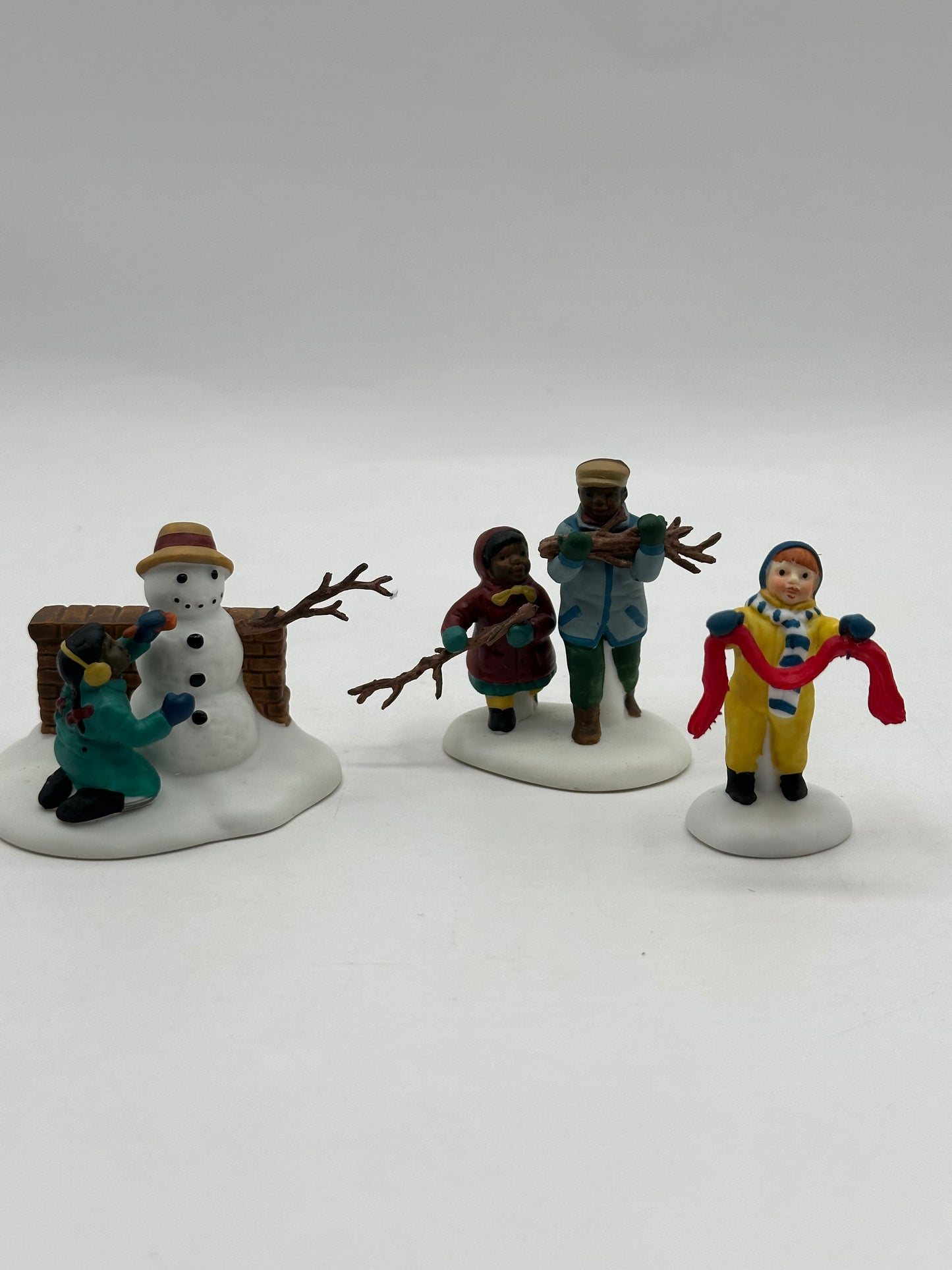 Department 56 – Playing In The Snow – Christmas in the City