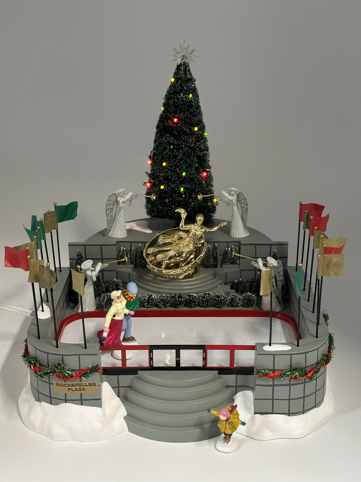 Department 56 - Rockefeller Plaza Skating Rink - Village Accessories (Only One Skater Skates)