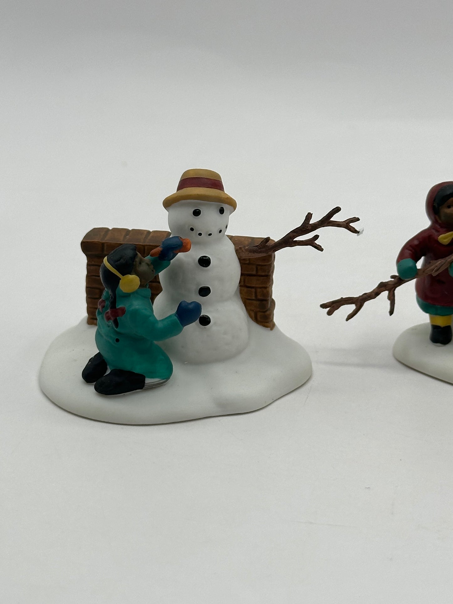 Department 56 – Playing In The Snow – Christmas in the City