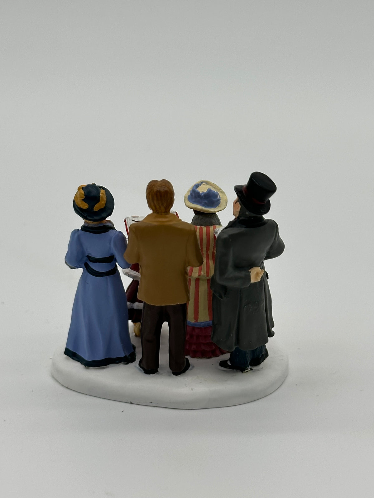 Department 56 - Singing Carols In Town - Seasons Bay